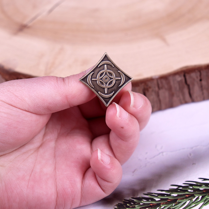 Cosmere Symbol Badge Stormligh - Vintage Fashion Archive recension och pris