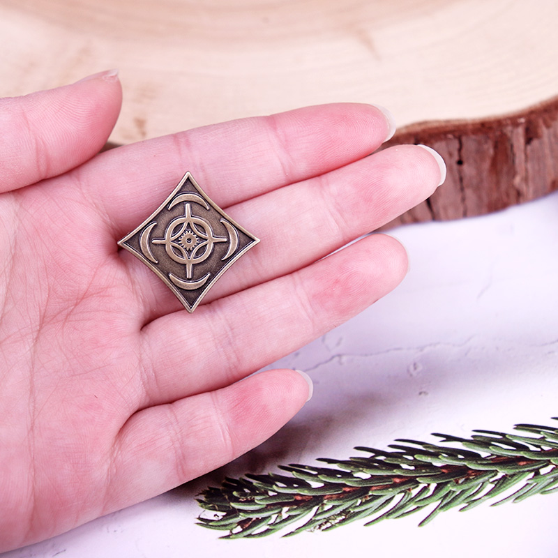Cosmere Symbol Badge Stormligh - Vintage Fashion Archive recension och pris